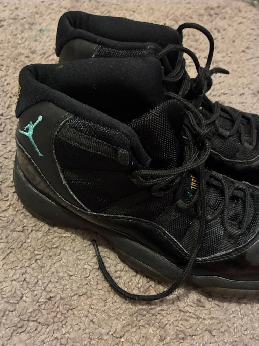 Jordan Black High-Top Sneakers with Teal Jumpman Accent